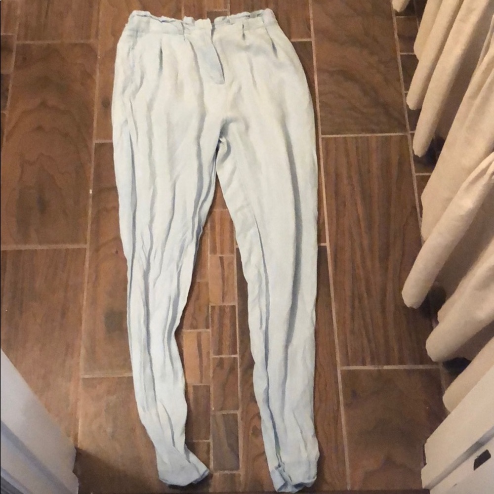 Thin parachute like pants with tight ankle